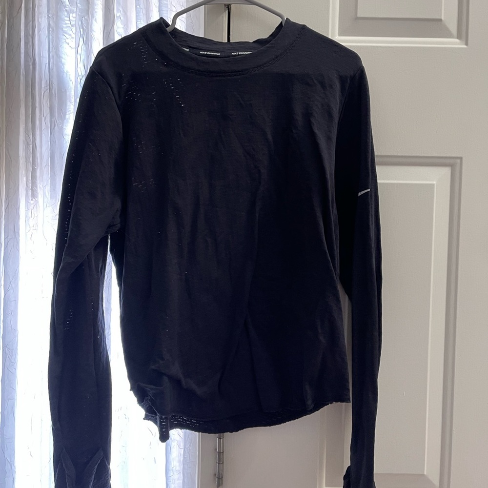 Nike runners top with logo on sleeve